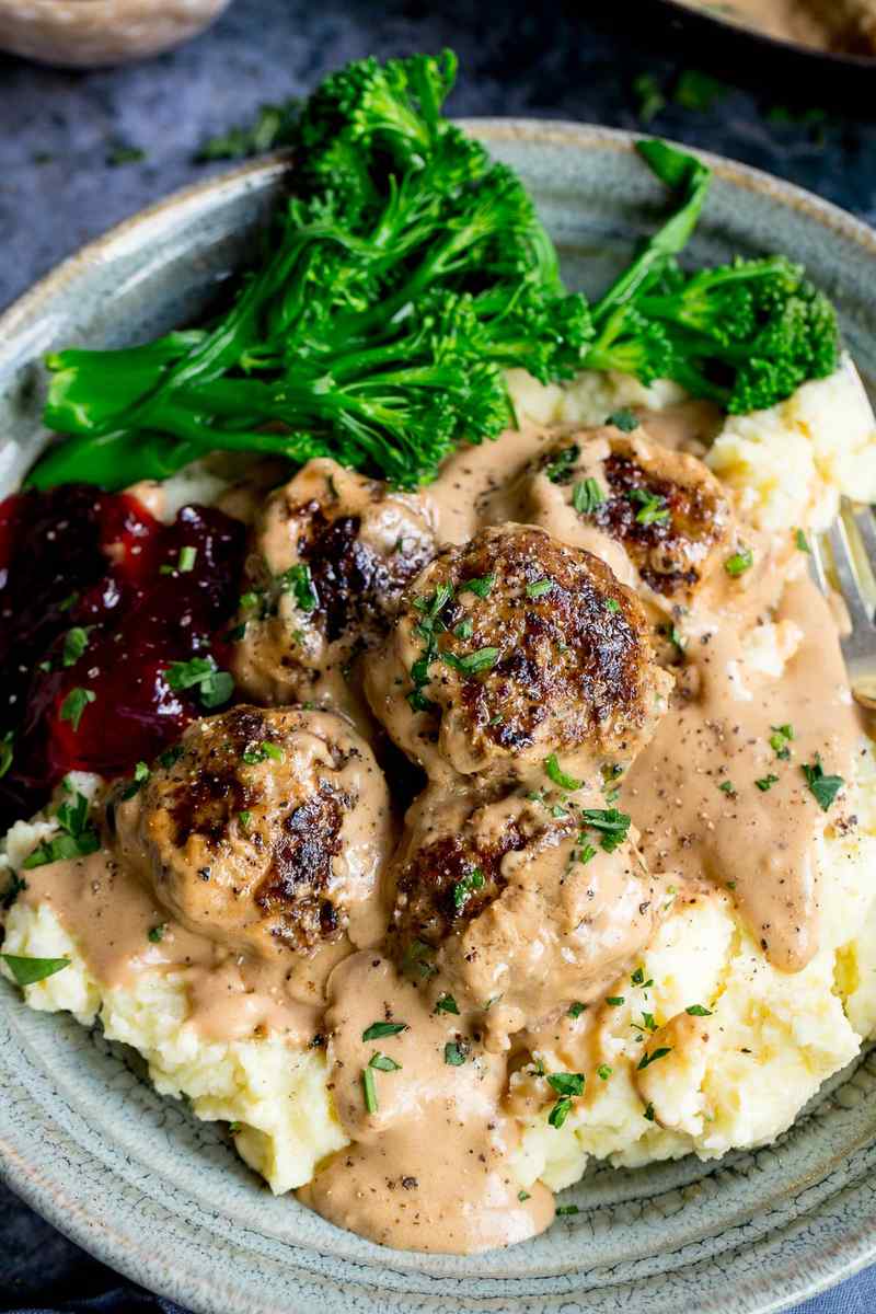 Creamy mashed potatoes crowned with glossy Swedish meatballs and rich cream gravy
