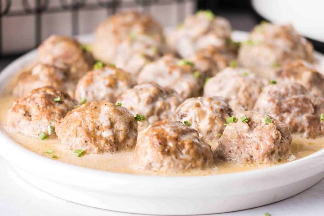Gluten-free Swedish meatballs coated in rich, velvety cornstarch-thickened brown gravy