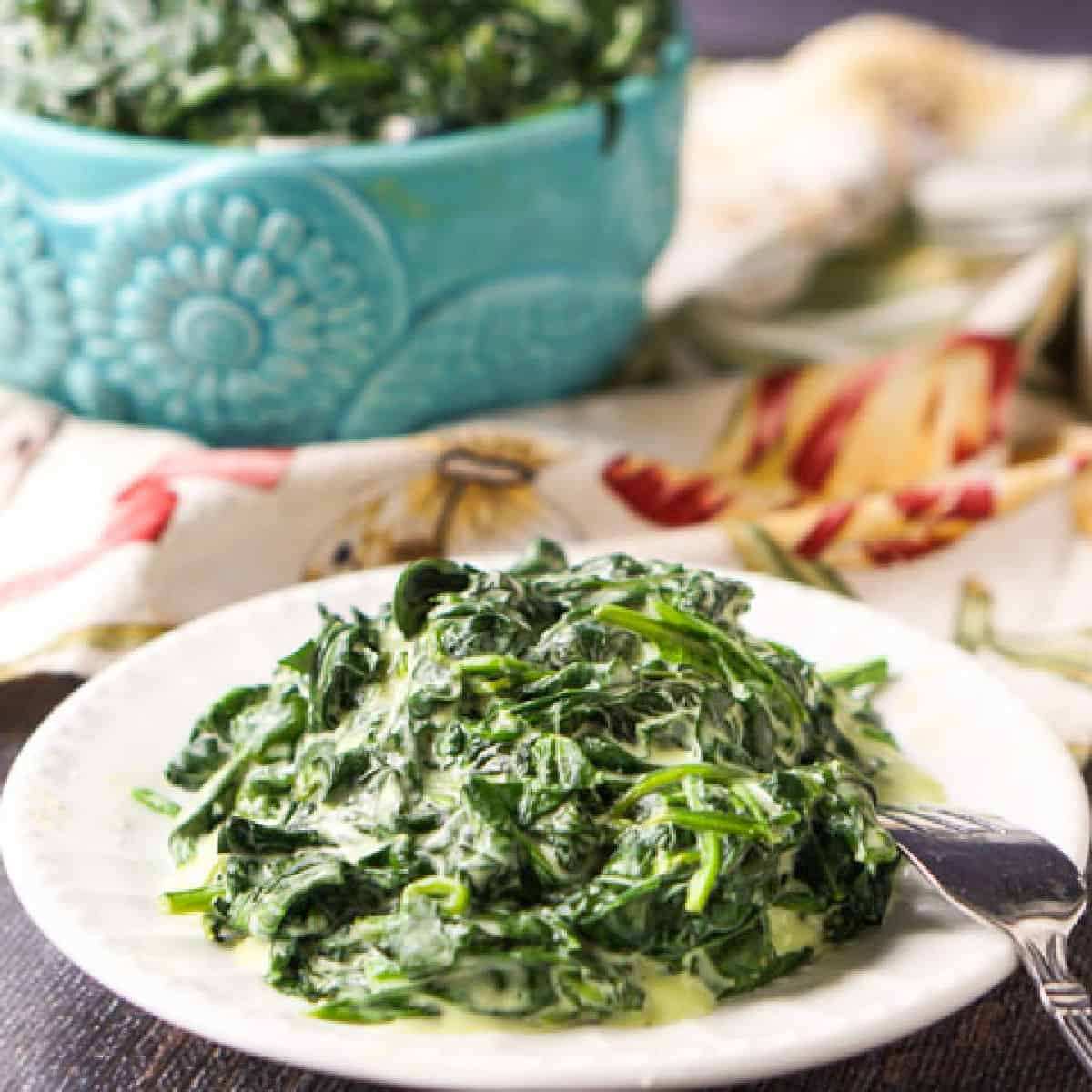 Velvety spinach in a garlic‑cream sauce, topped with a sprinkle of Parmesan cheese