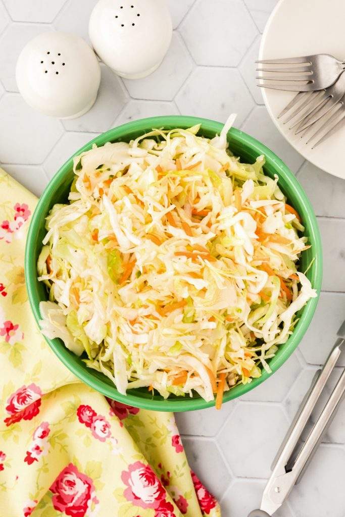 Zesty vinegar slaw with crisp cabbage, fresh parsley, and a bright herb‑infused tang