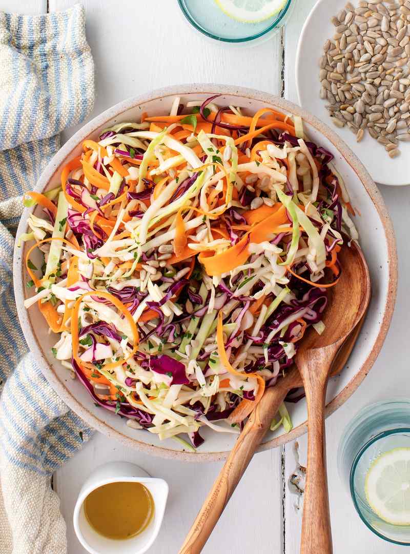 Mustard‑dill vinaigrette coating crisp cabbage, herbaceous aroma, and tangy crunch