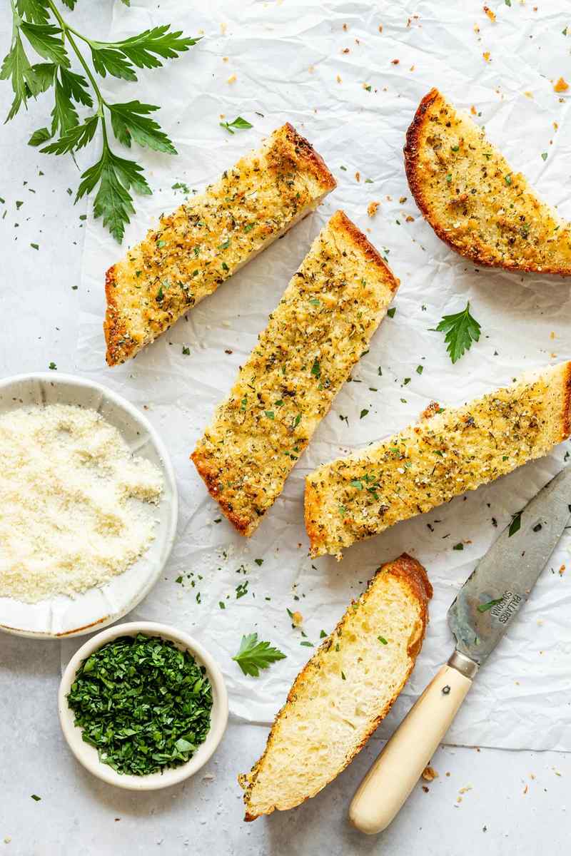 Twisted garlic bread with crisp Parmesan crust, buttery garlic, and herbs