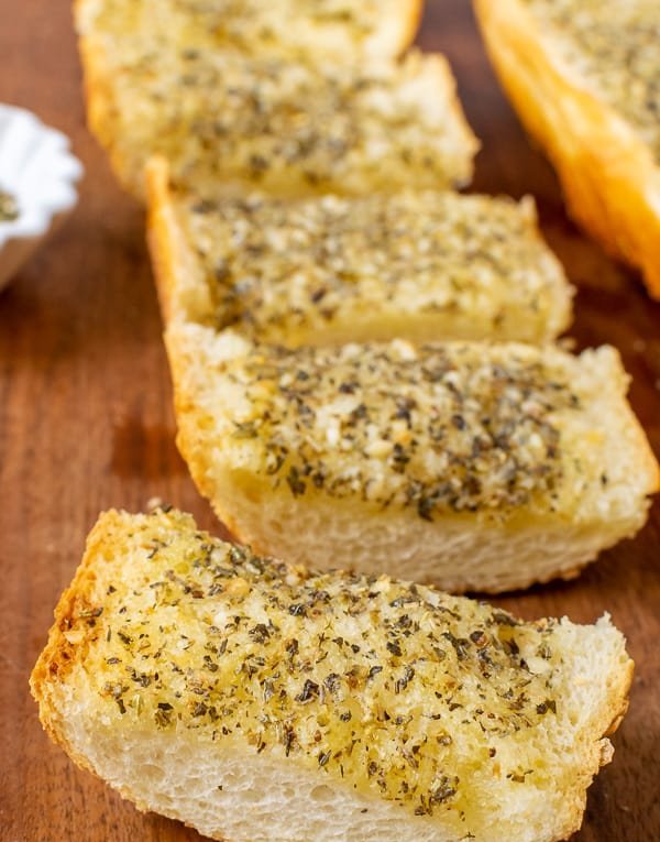 Crispy golden garlic bread with melted butter and a fragrant garlic aroma