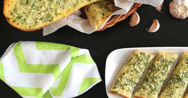 Aromatic garlic bread with herb-infused butter, crisp golden crust, and a touch of parsley