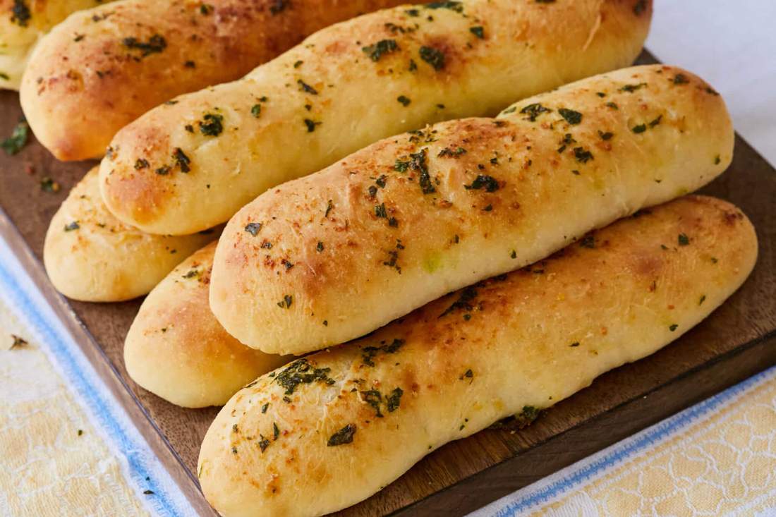 Classic garlic bread with smoky chipotle butter, golden crust, and a sprinkle of cilantro