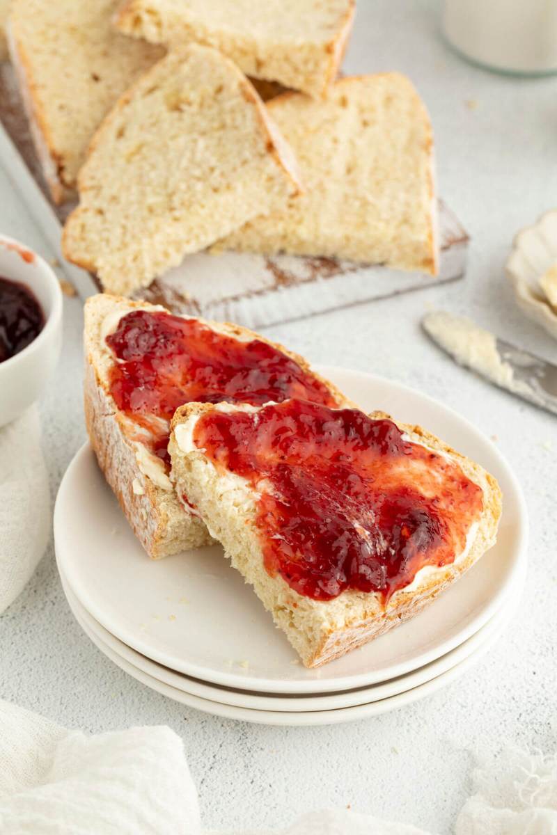 Rustic soda bread loaf with tangy sourdough flavor and golden crust