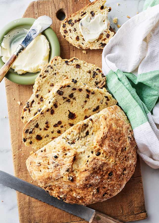 Golden‑crusted Irish soda bread loaf with soft, fluffy interior