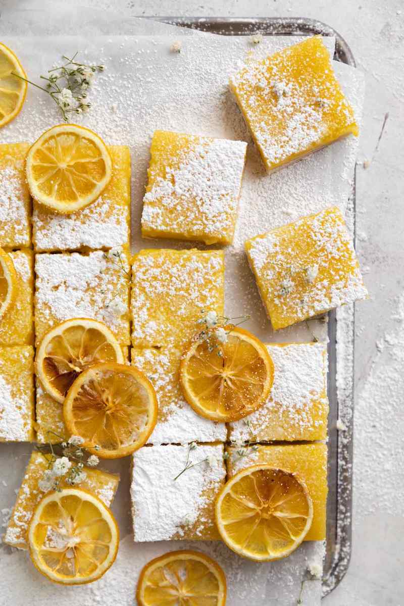 Golden shortbread crust, bright lemon curd, light powdered sugar topping