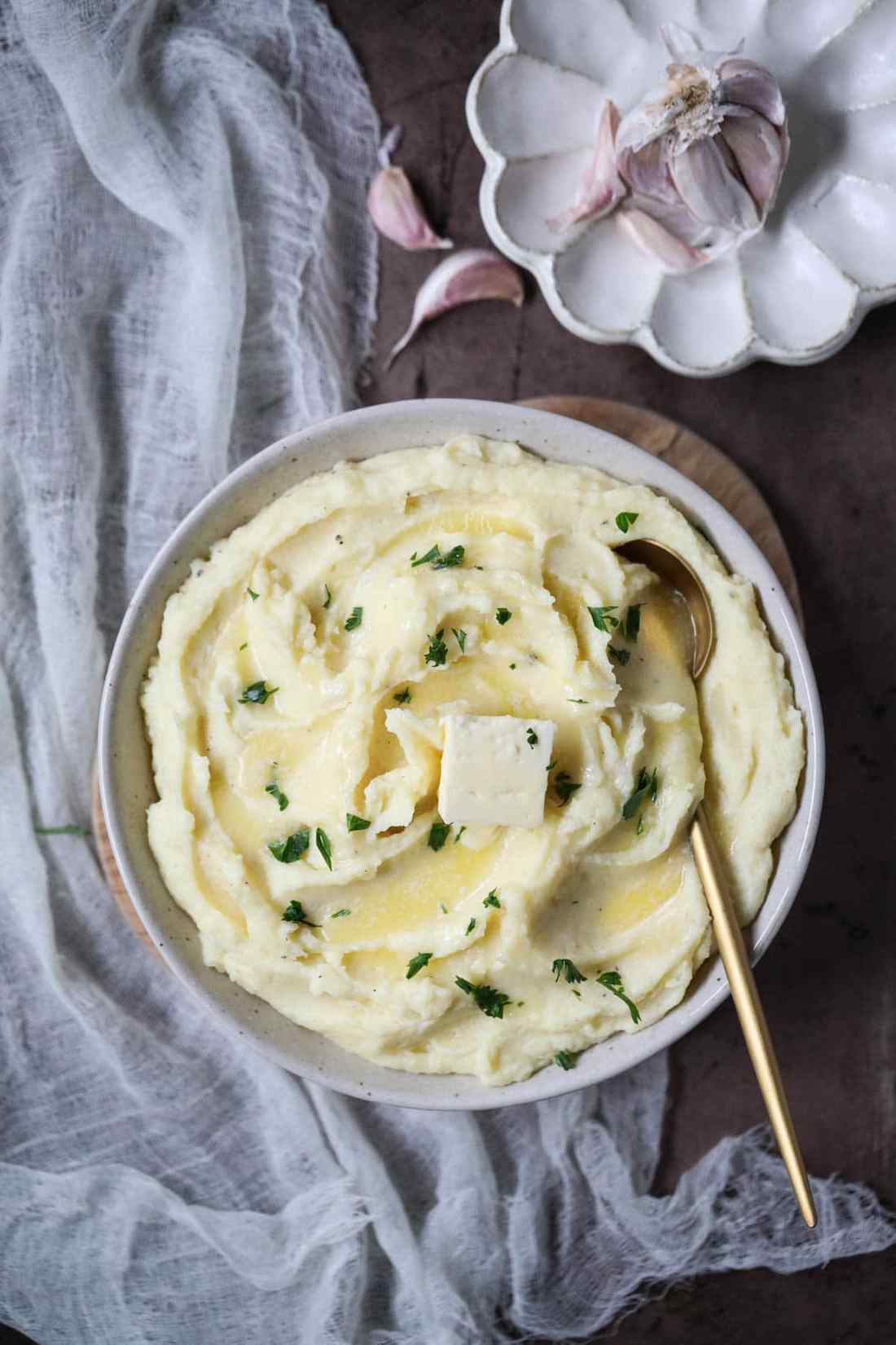 Creamy mashed potatoes folded with sweet caramelized shallots and golden melted garlic butter