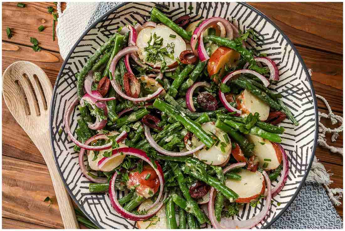 Classic creamy potato salad with tender potatoes, velvety dressing, fresh herbs, and crunchy celery
