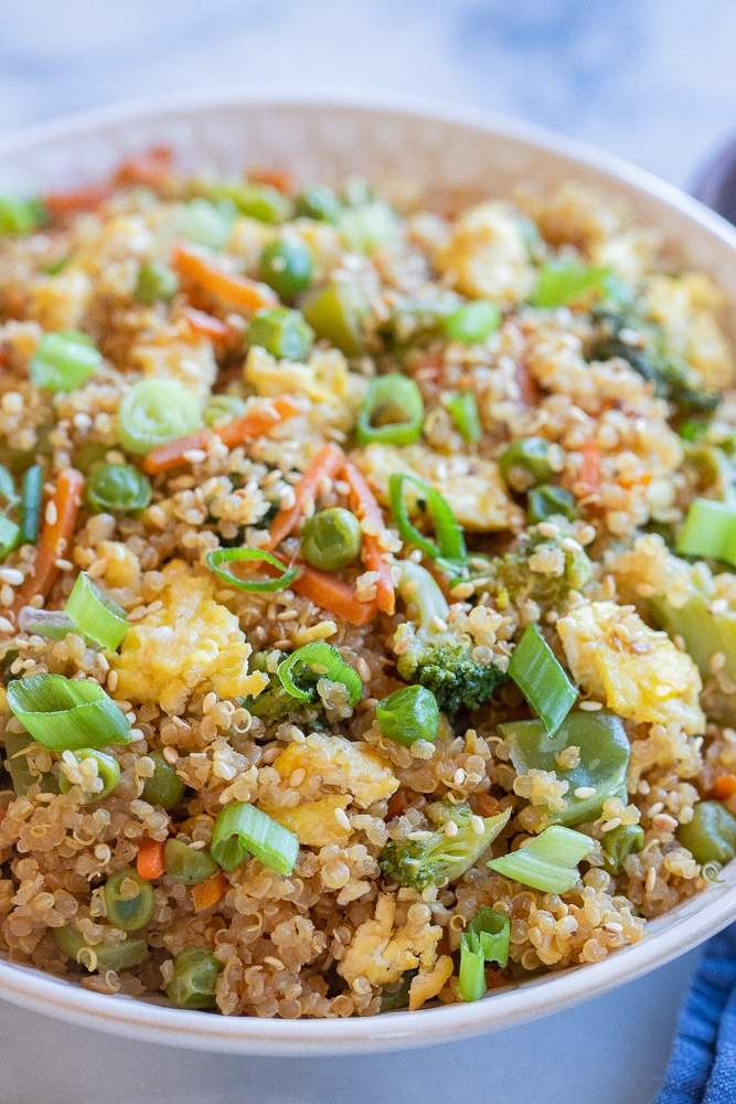 Spicy ginger quinoa fried rice with crunchy veggies and a splash of lime
