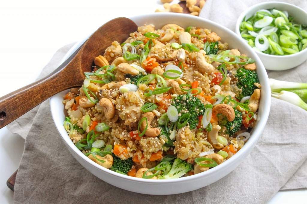 Autumn harvest quinoa fried rice with roasted veggies, fluffy grains, and soy glaze