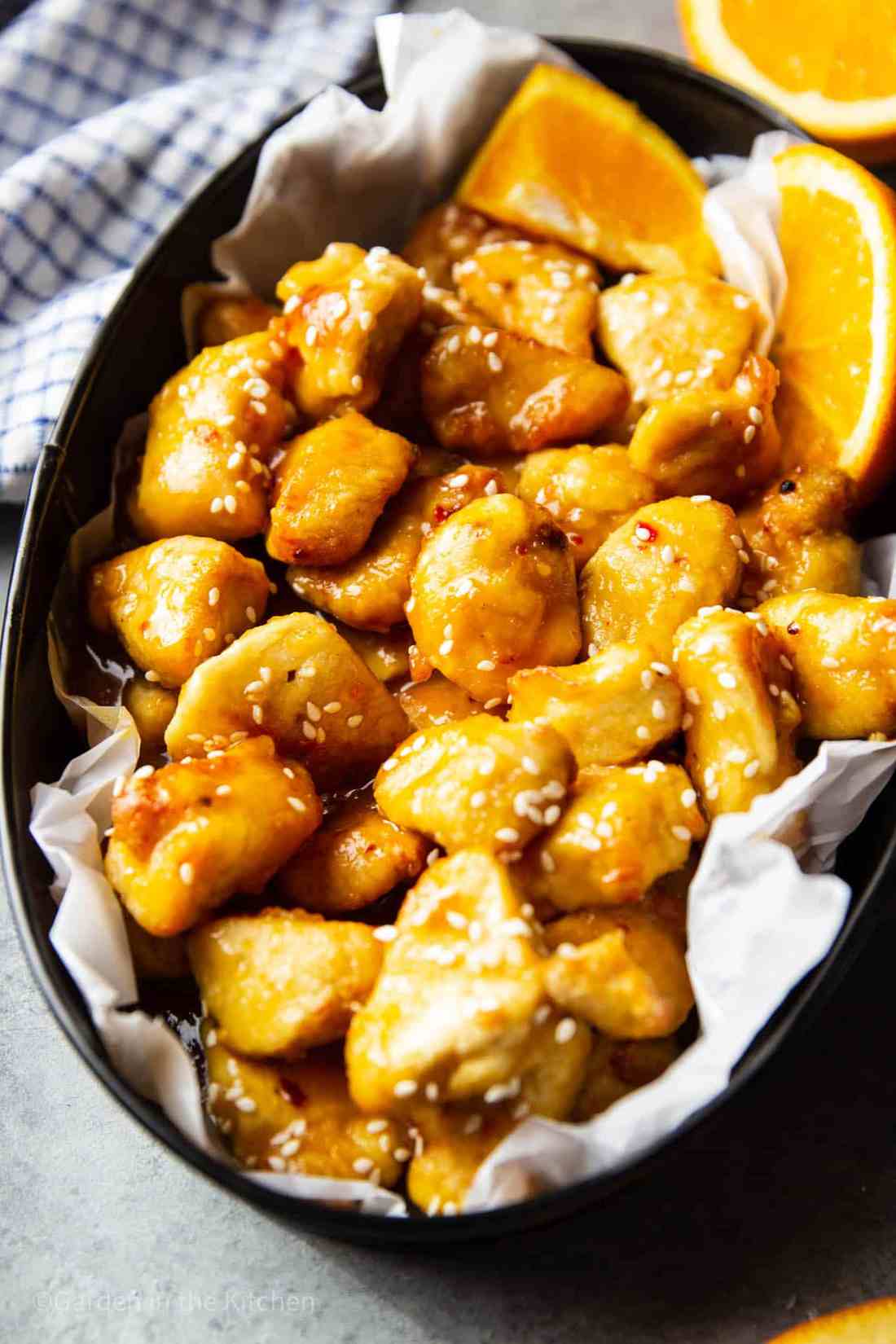 Orange‑glazed skinny chicken served over sautéed zucchini from the air fryer with fresh orange zest