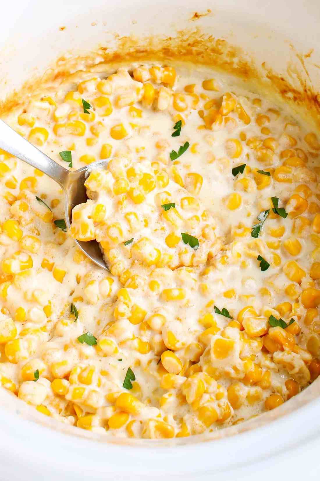 Classic slow‑cooker creamed corn with cheddar cheese, buttery creamy sauce, hearty crockpot side