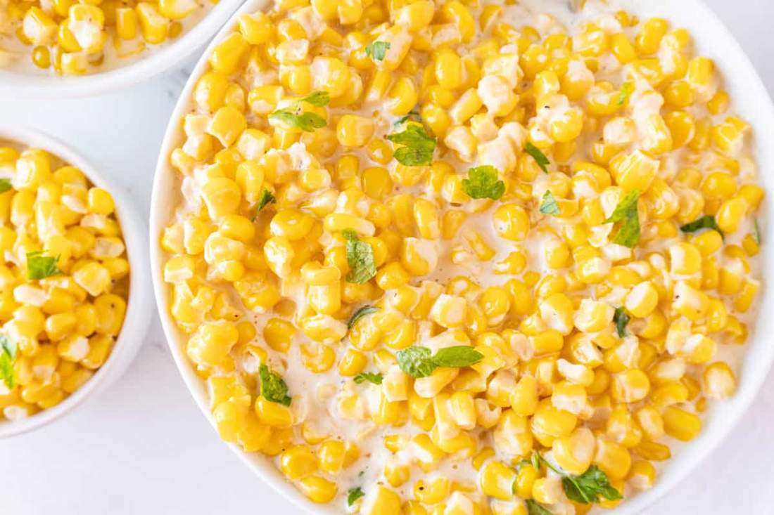 Creamy sweet corn with buttery sauce, slow cooker Thanksgiving side dish, golden and inviting