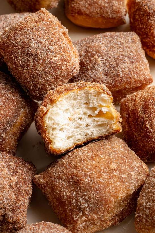 Rustic soft pretzel bites dusted with flaky sea salt, golden exterior, served with honey mustard dip