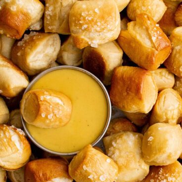 Classic salted soft pretzel bites with golden crust, sea salt, and a creamy dip