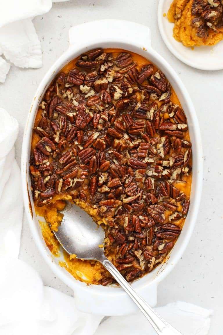 Gluten-free sweet potato casserole with crunchy toasted pecan streusel, brown sugar, and aromatic cinnamon.