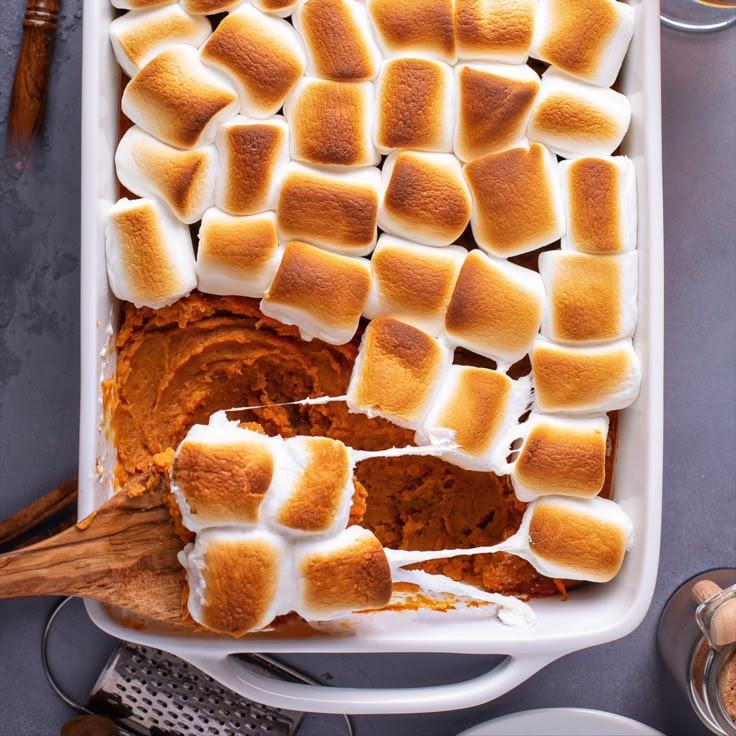 Savory-sweet classic sweet potato casserole layered with candied bacon, pecan streusel, cinnamon, and brown sugar.